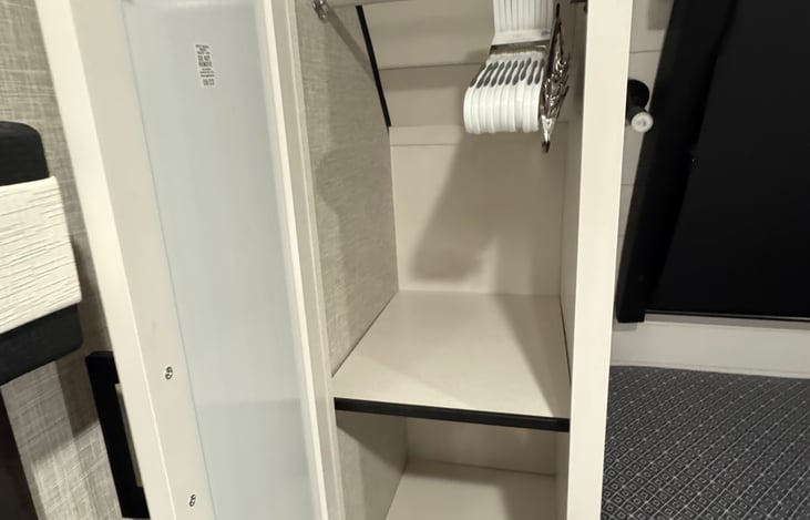 Bedroom dual wardrobes with hangers