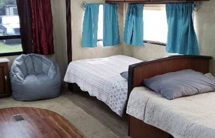 Couch folds into a twin bed & dinette folds down into a twin bed