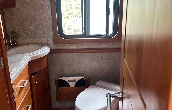 Bathroom, sink and plenty of storage.