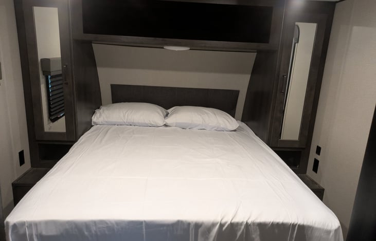 Dining table, and storage space underneath the bed.