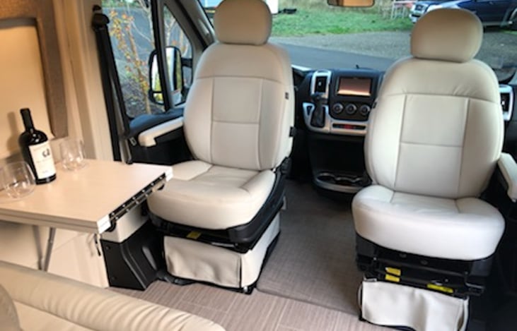 Swivel captain's chairs.