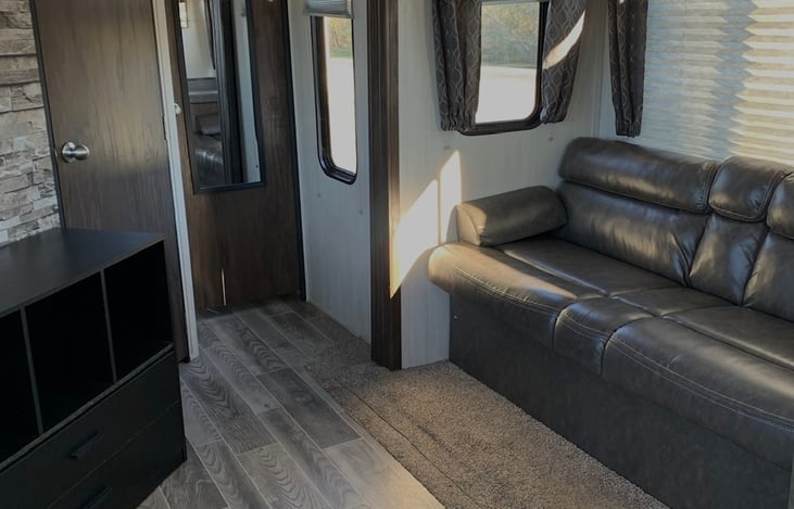 Couch does fold down. Suitable for children. Air mattress under couch for added comfort.