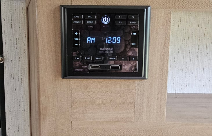 Am/fm/bluetooth radio. With speakers indoor and out.