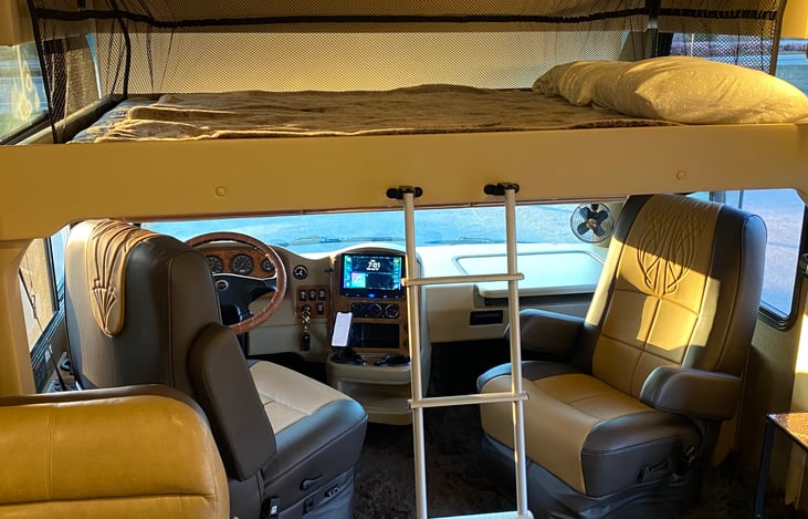 Full size bed and pillows provided.