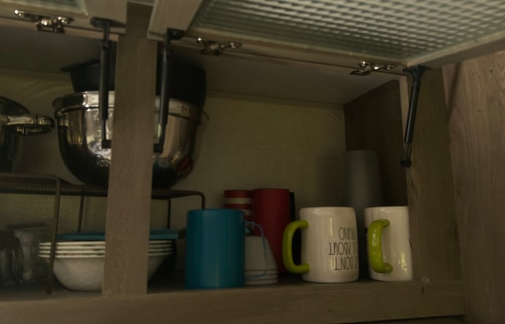 Fully stocked with cups, bowls, pots and plates