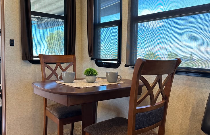 Kitchen table (also has an insert and 2 extra foldable chairs stored in closet)