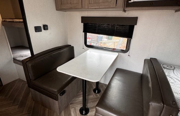 Dinette has wide bench seats that are comfortable for up to four people.