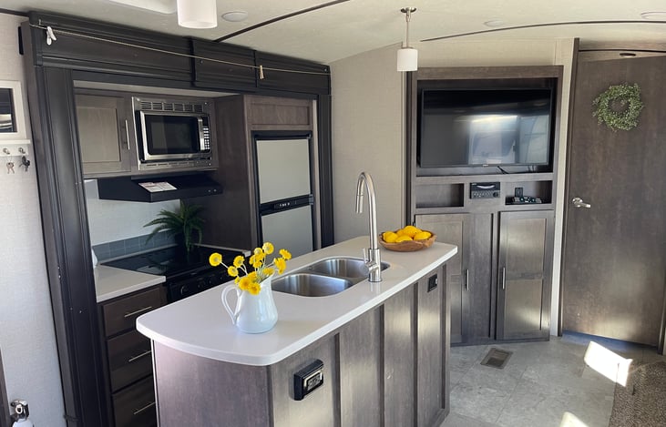 Living space looking towards bunk room that has its own separate door