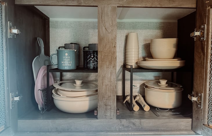 Brand new set of pots with removable handle. 
Brand new set of plates, cups and bowels.