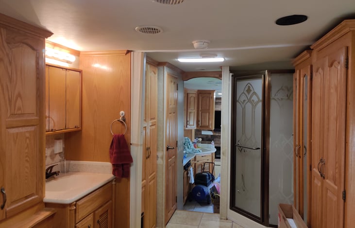 from the bedroom you can see the sink, and shower and so much closet space. And the door to the restroom
