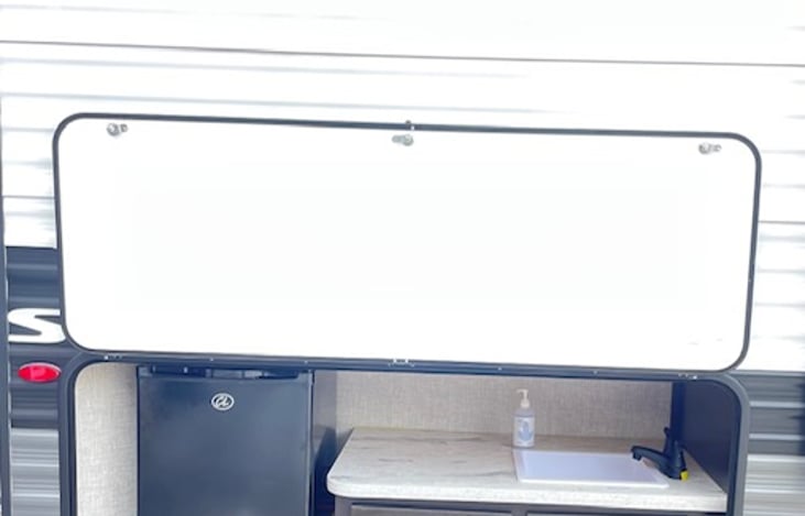 outside sink and mini fridge