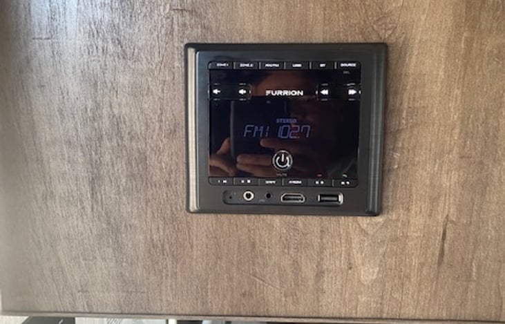 Bluetooth capable radio with outside/inside speakers. HDMI, Aux, and USB connections available.