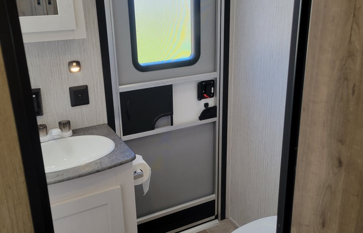 No need to walk all the way through the camper to use the bathroom or shower when you have a second entrance straight into the bathroom!