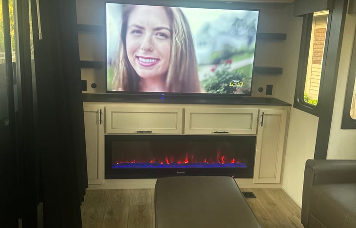 Cozy Fireplace and Large TV