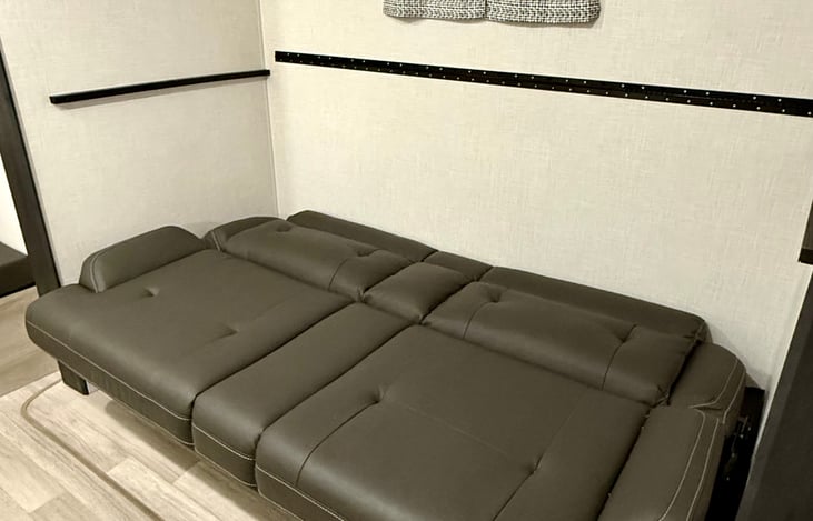 Couch/full bed in bunk room