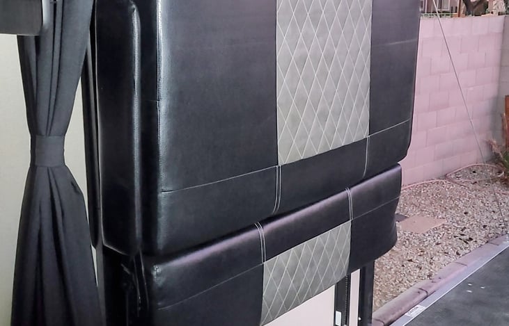 With the bench seat stored on the wall, the ceiling height of the garage space will be 80 inches.  This does narrow the width of the garage space.