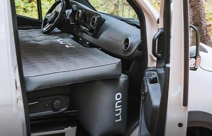 Expanded Sleeping option in front seat! Allows for a 7th person!