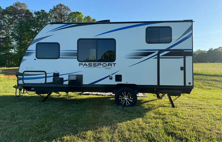Extra storage under bunk accessible via small door.