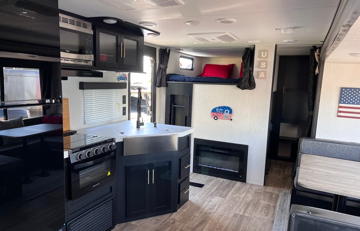 View of kitchen from couch