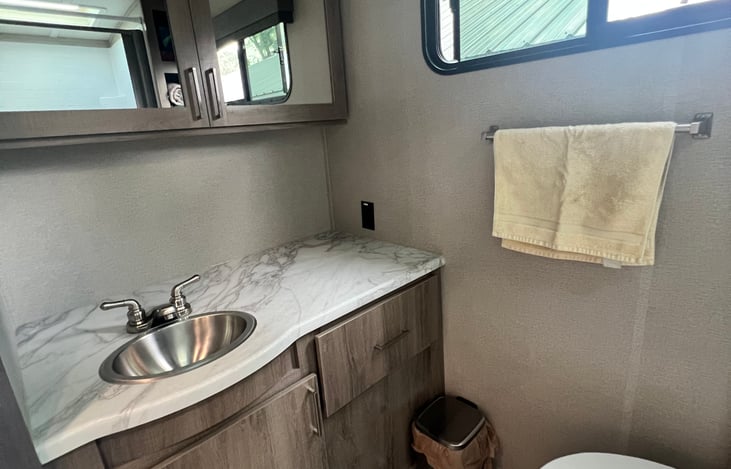 Bathroom sink with large counter space.