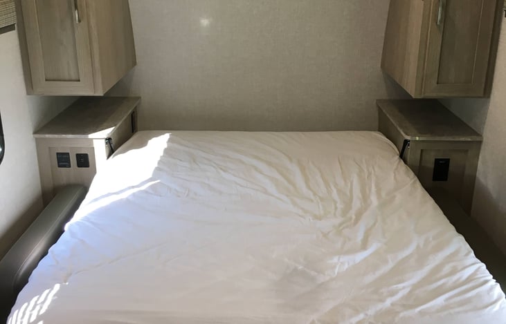 Murphy bed that folds down where the couch is.