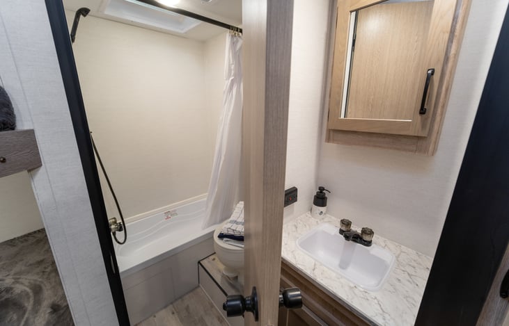 Shower is for storage, please use campground facilities. RV toilet paper included for toilet.