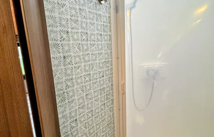 Towel hooks in the bathroom.