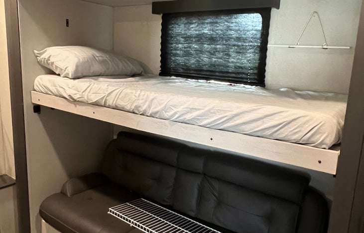 Bunkhouse, one bunk, couch under pulls out