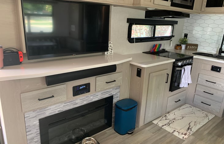 Main TV and Electric Fireplace