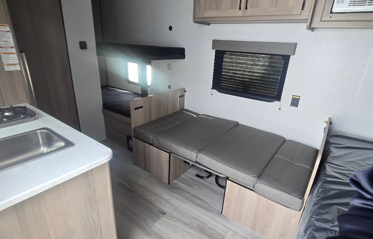 Dining area folds into a sleeping area.