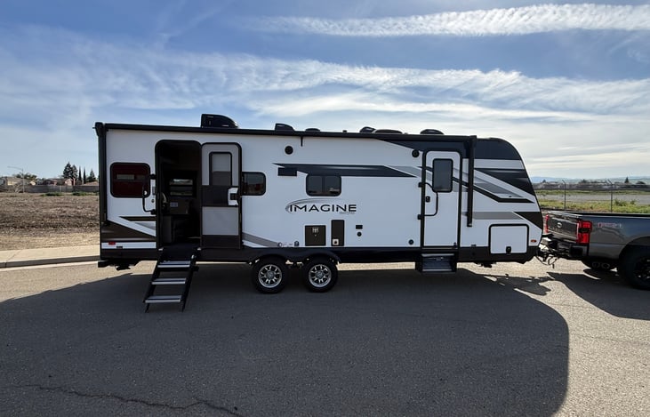 This side has two doors, one Leads to the living space and the other is to the bedroom.