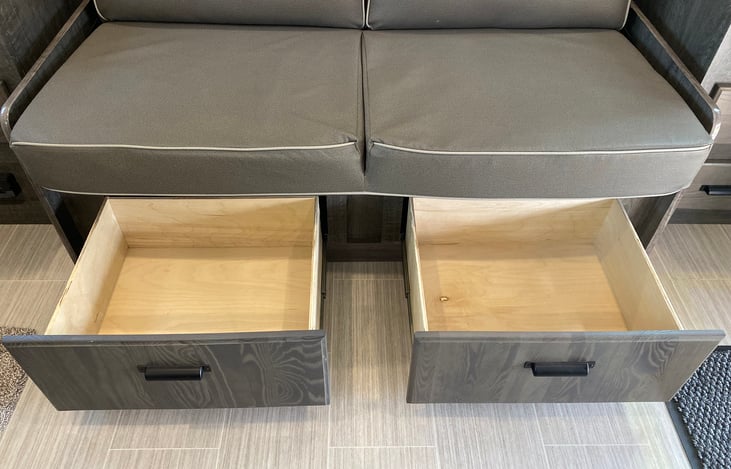 Large drawers for clothing keeps the space clutter free.