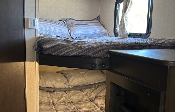 Two twin bunk beds with Linens