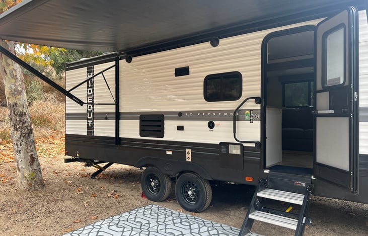 Retractable motorized awning.
Outdoor speakers and lighting