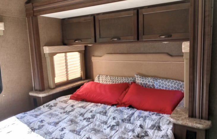 This is the pop out queen size bed with storage compartments.