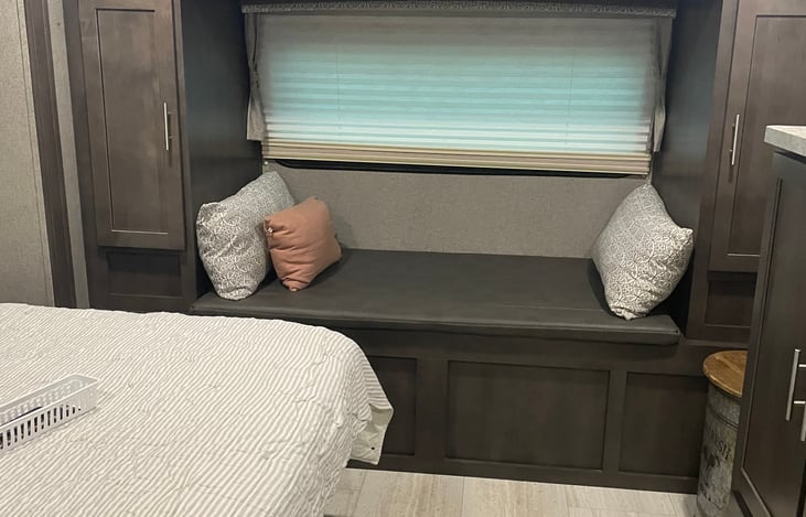 Window Seat in the bedroom to relax, read a book, or a bed for one.