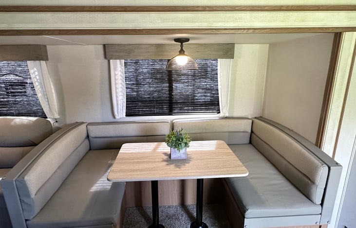 Dinette. Converts to a bed. Has lots of storage under each seat.