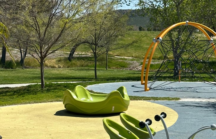 Climb , spin or rock .... they've got it all! what an incredible backdrop while playing in the midst of all this nature! sensory overload in a good way!