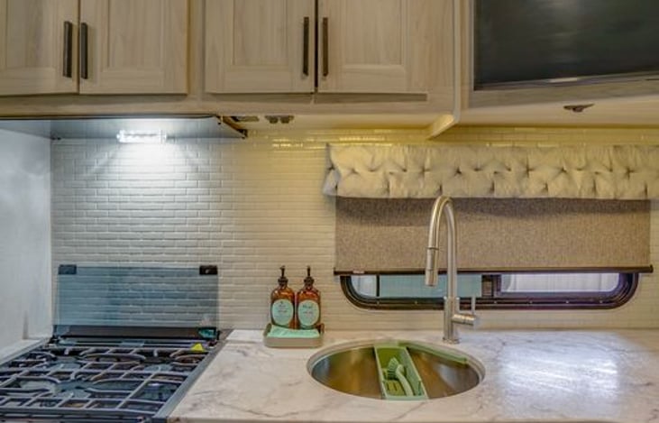 Master Chefs appliances. 3 top stove burners and 1.3 microwave/convection oven. Under cabinet lights and outlets.