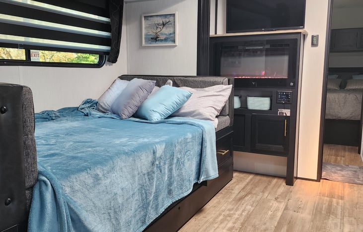 Table turns into a comfy fire side bed for 2!