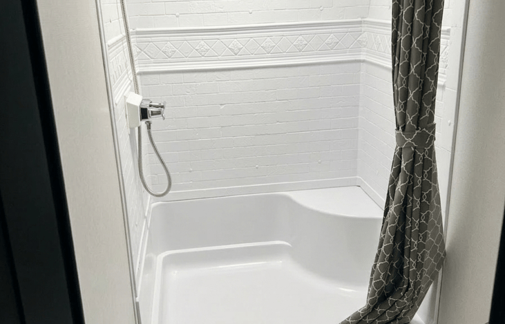 Hot and cold water bathroom with full shower