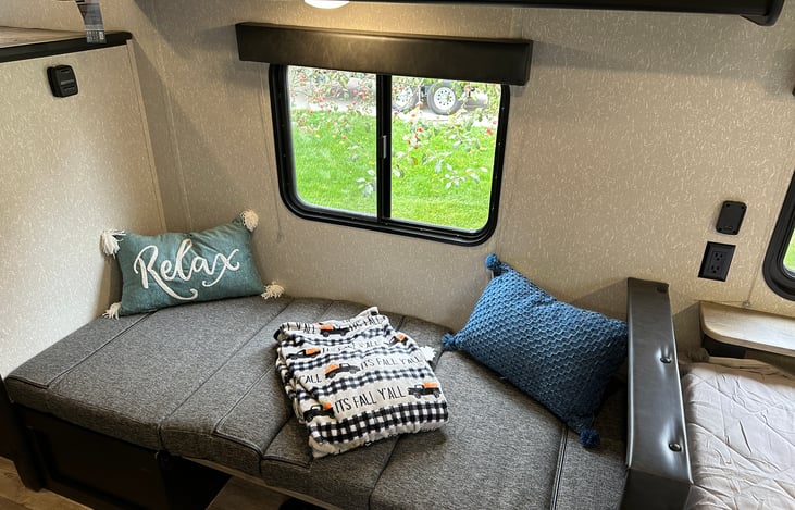 Dinette one minute, awesome bed the next.  Perfect!