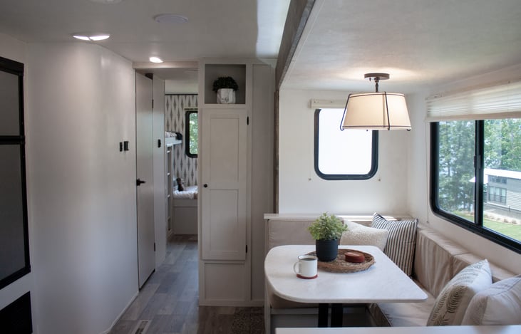 Maximize convenience with a versatile dining area that easily converts into a cozy sleeping space.