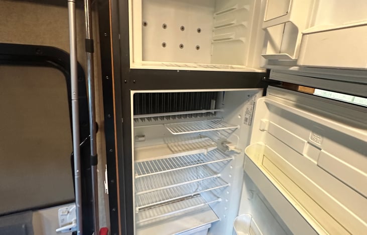 Fridge/Freezer combo.  Runs off propane or 30 AMP electricity.