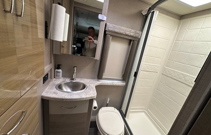 Bathroom (note: the primary GFI receptacle is just to the left of the sink.  If at anytime an outlet isn't working anywhere in the coach, the GFI may need to be reset).