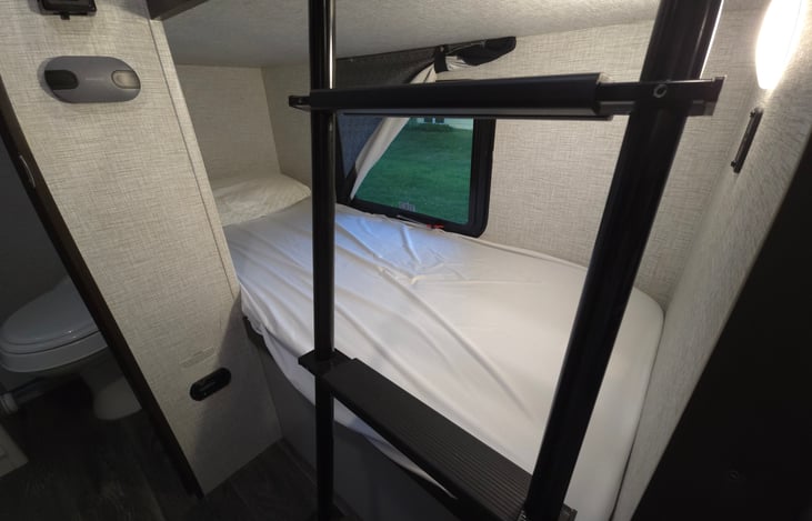 Bottom bunk with lighting and USB charging