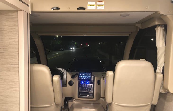 Large and comfortable front seats; apple car play, dual side video camera when changing lines and backup camera.