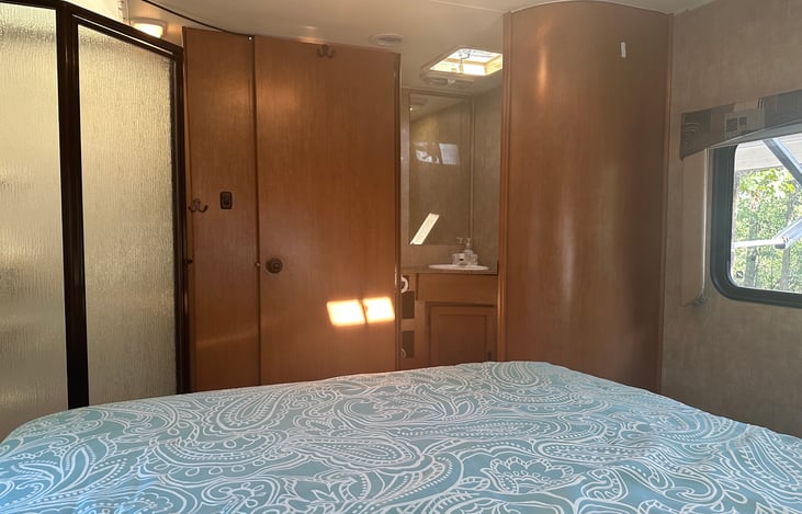 Master Bedroom closed door with shower and bathroom.