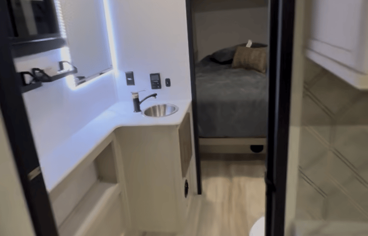 Spacious bathroom with a door to the master bedroom