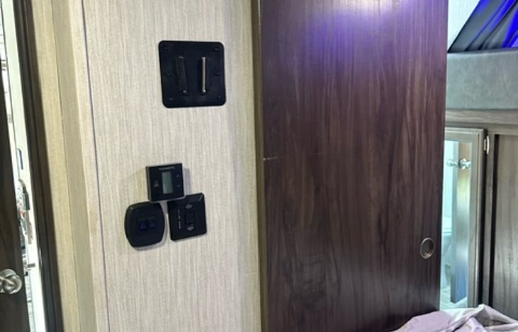 Sliding door for entry to bathroom from bedroom.